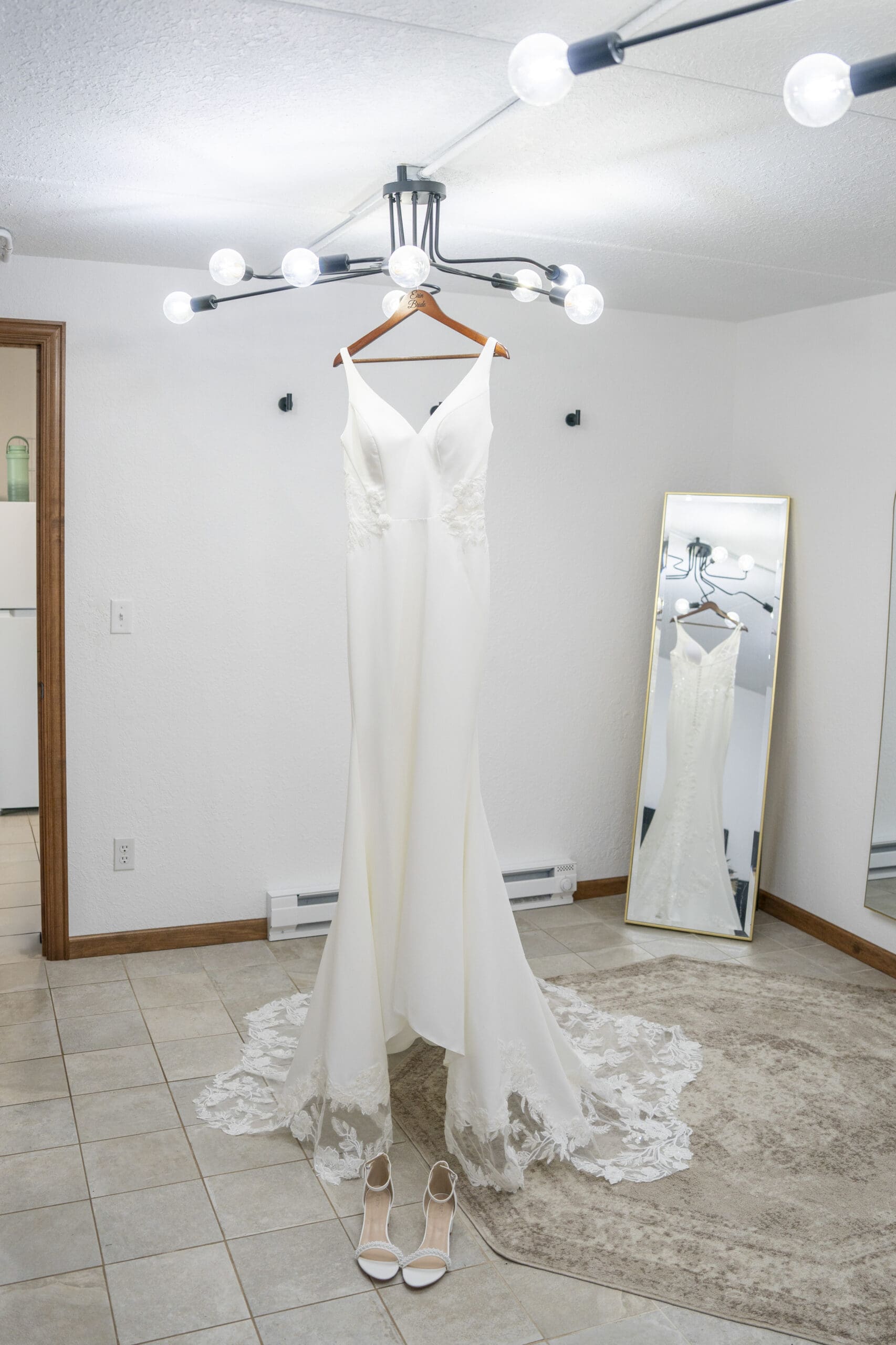 Wedding dress hanging up in the bridal suite in Central WI.