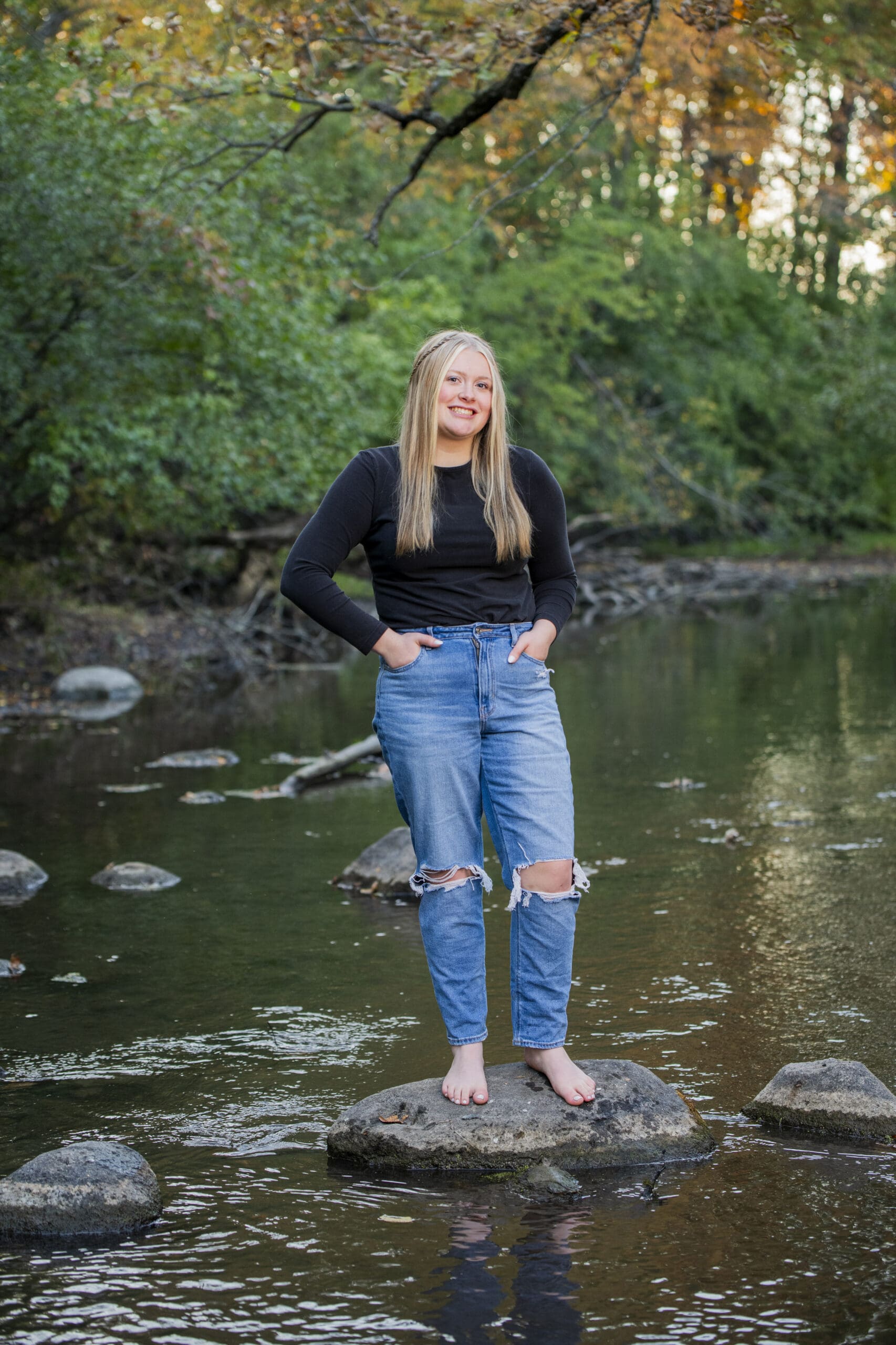 High school senior photographed at a scenic outdoor portrait location in Wisconsin
