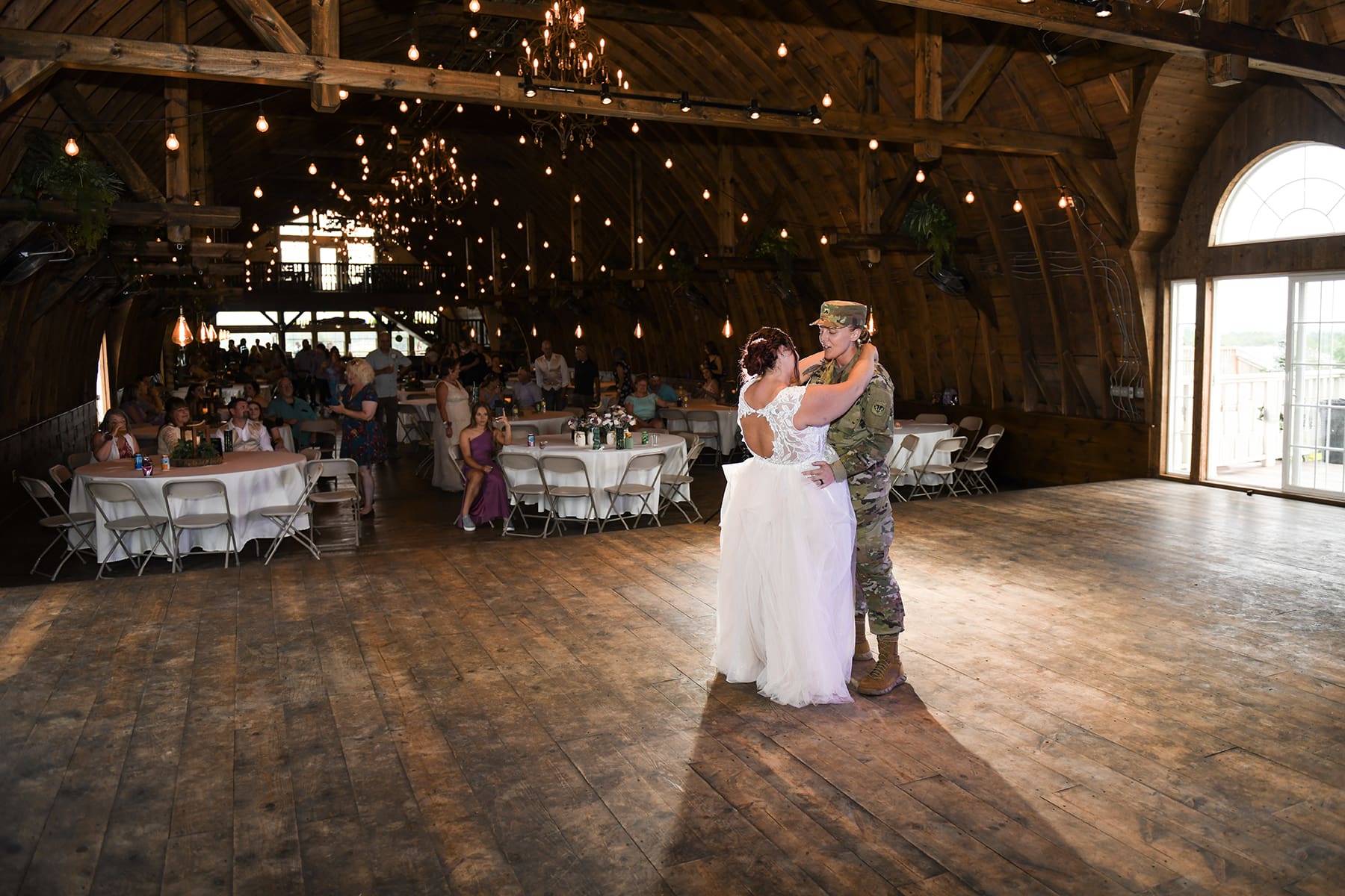 Newly weds dancing at rustic venue in Wisconsin