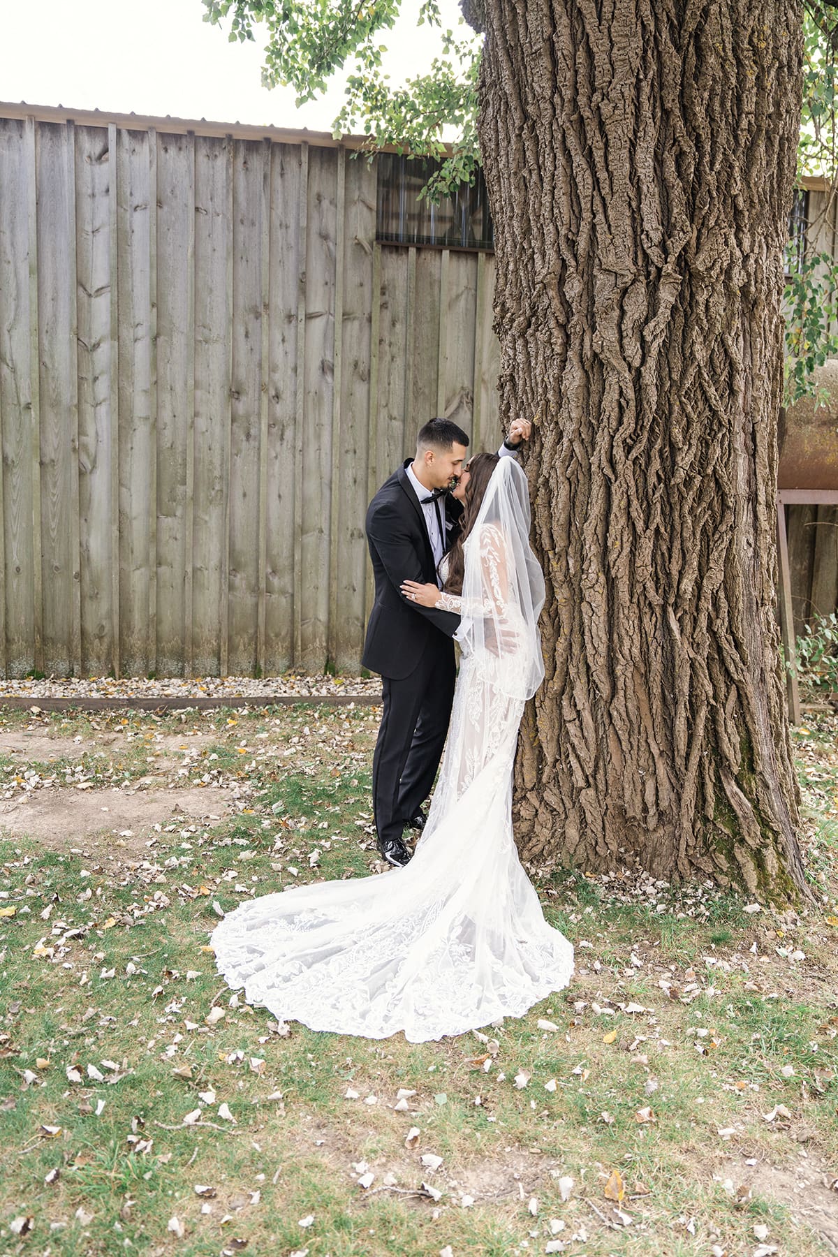 Bride and groom enjoying a private moment at Lilac Acres wedding venue in Wisconsin