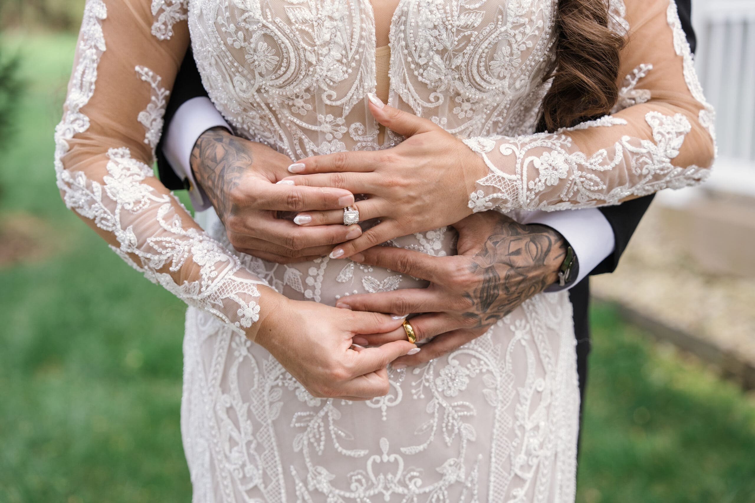 Close up of bride and groom exchanging wedding rings
