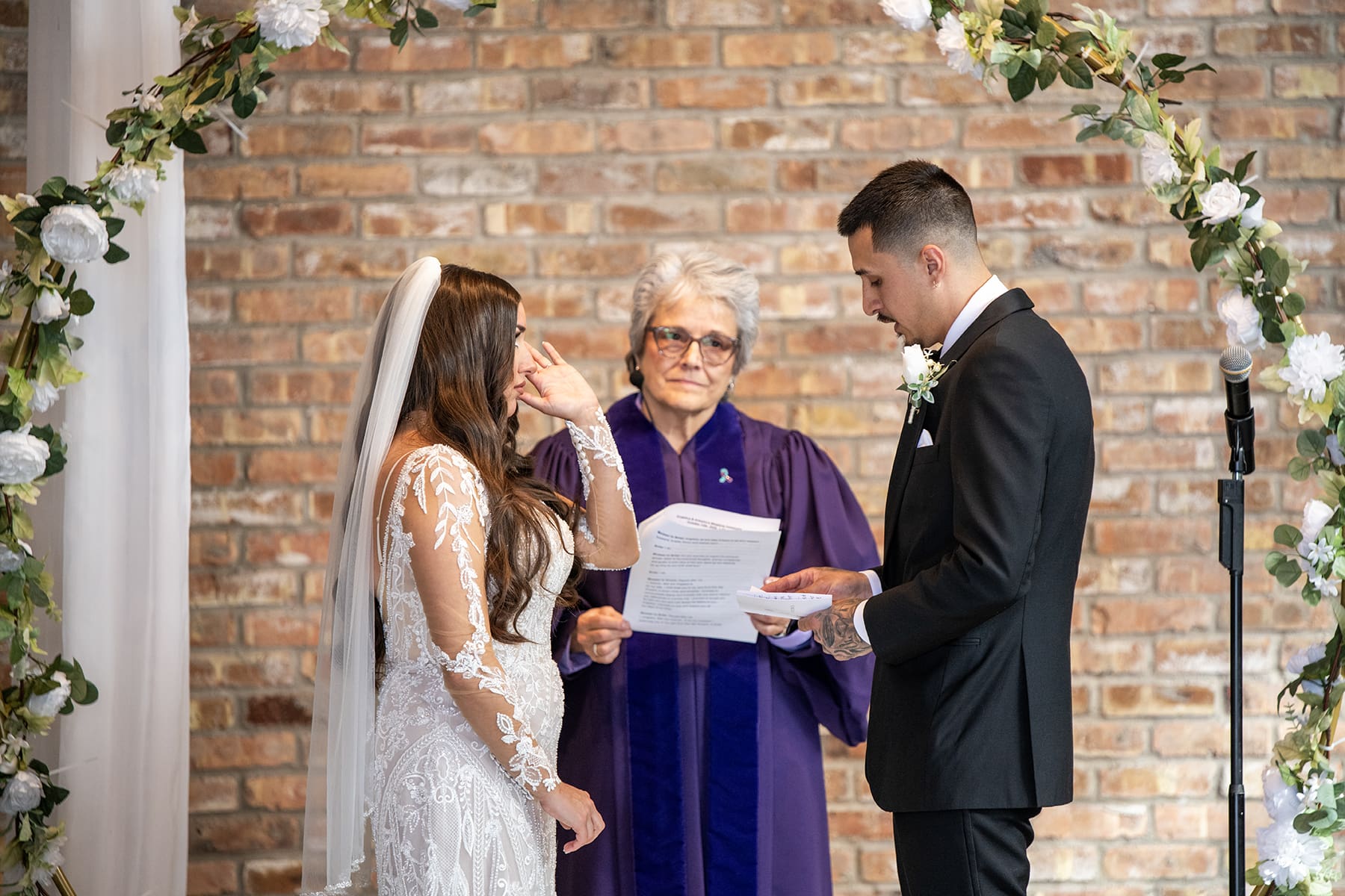 Bride getting emotional during the wisconsin wedding ceremony 
