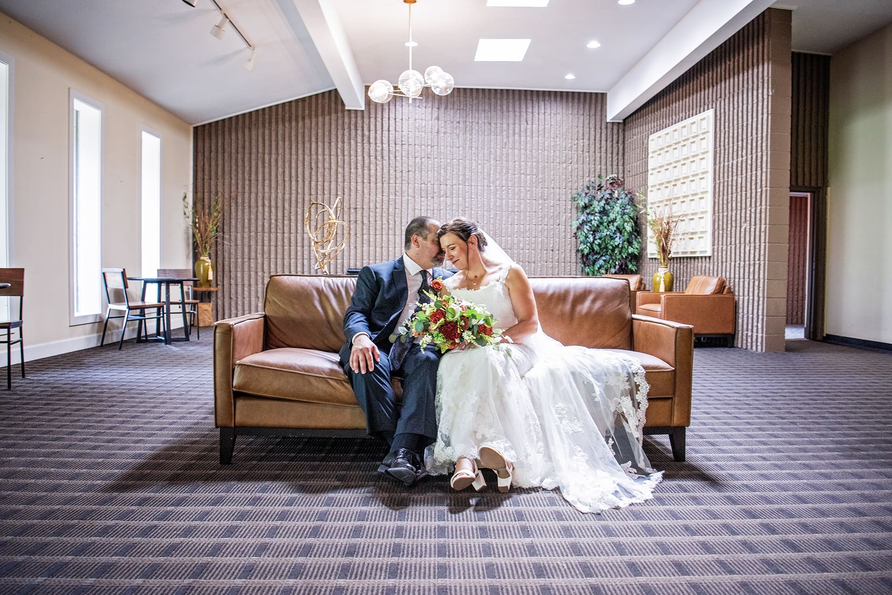 Central WI bride and groom sharing a moment before the wedding reception