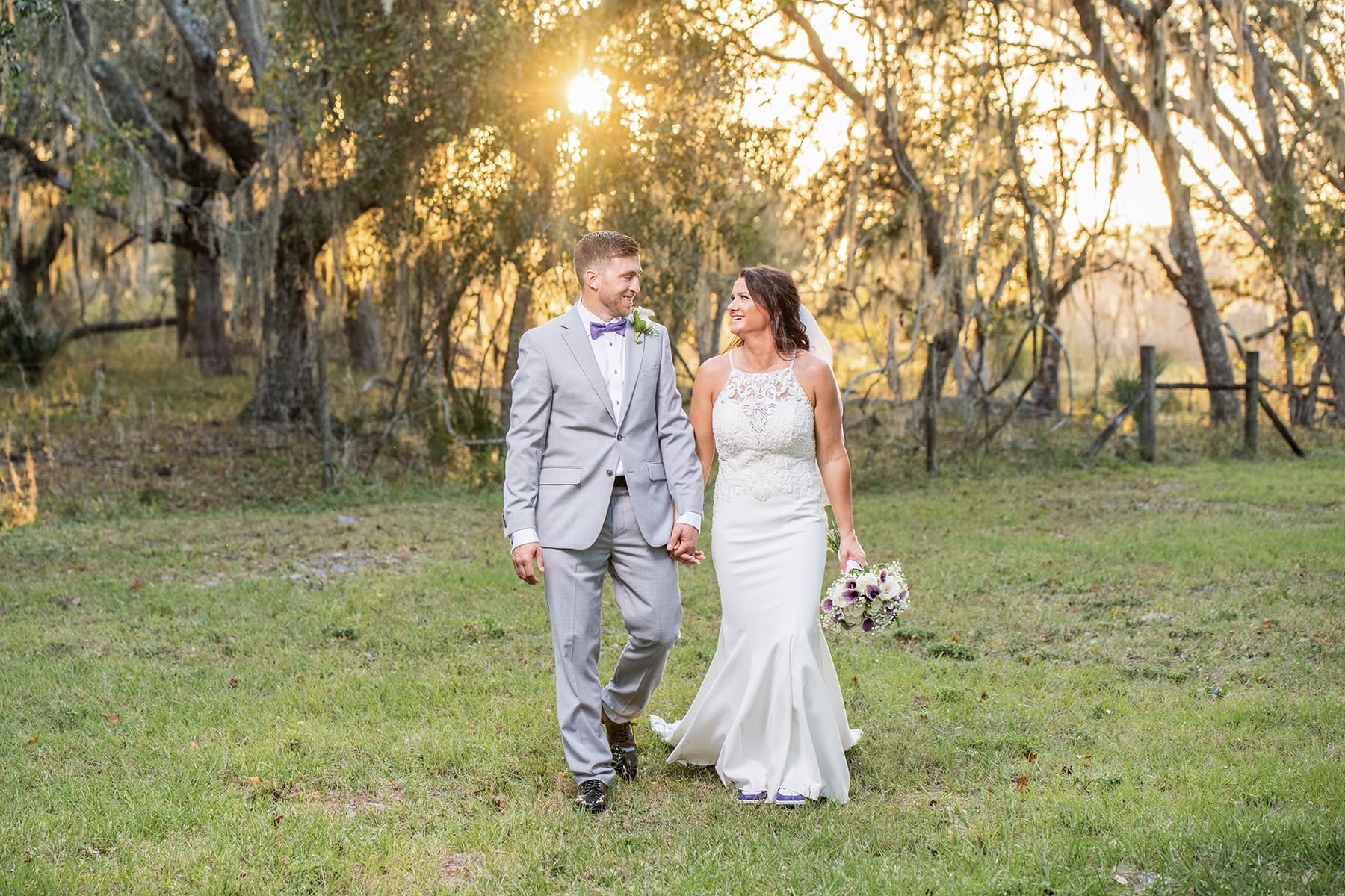 Central Wisconsin bride and groom walking during sunset