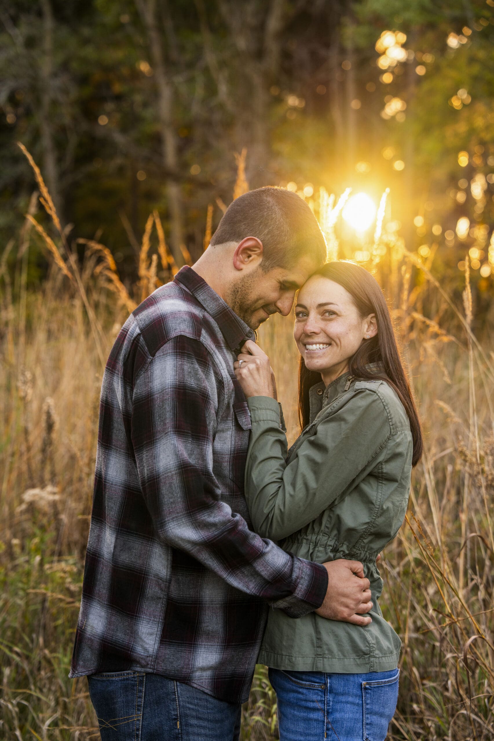 Delafield couple sharing a moment during golden hour during their engagement photo session