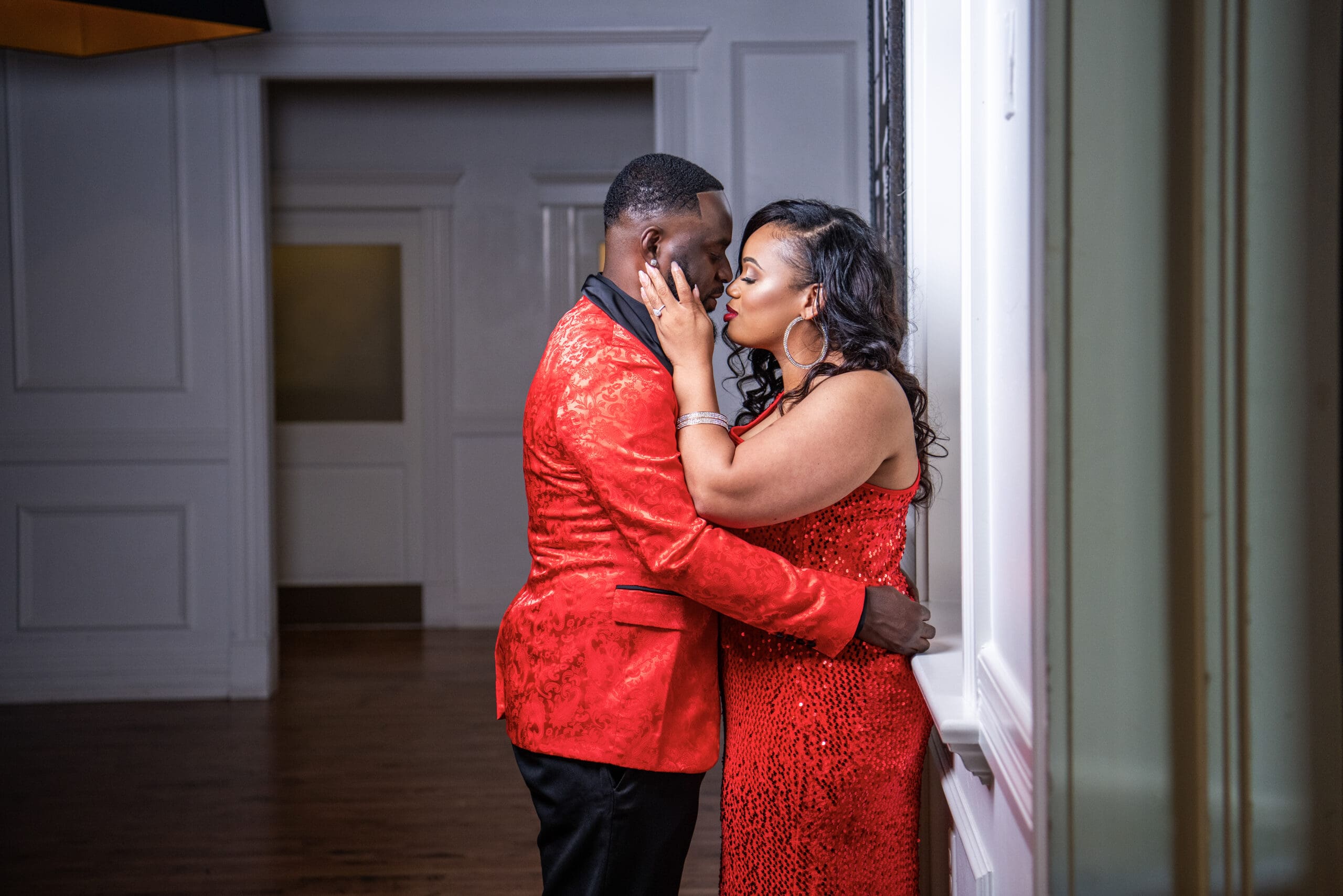 Delafield couple kissing during their engagement session at the Delafield Hotel