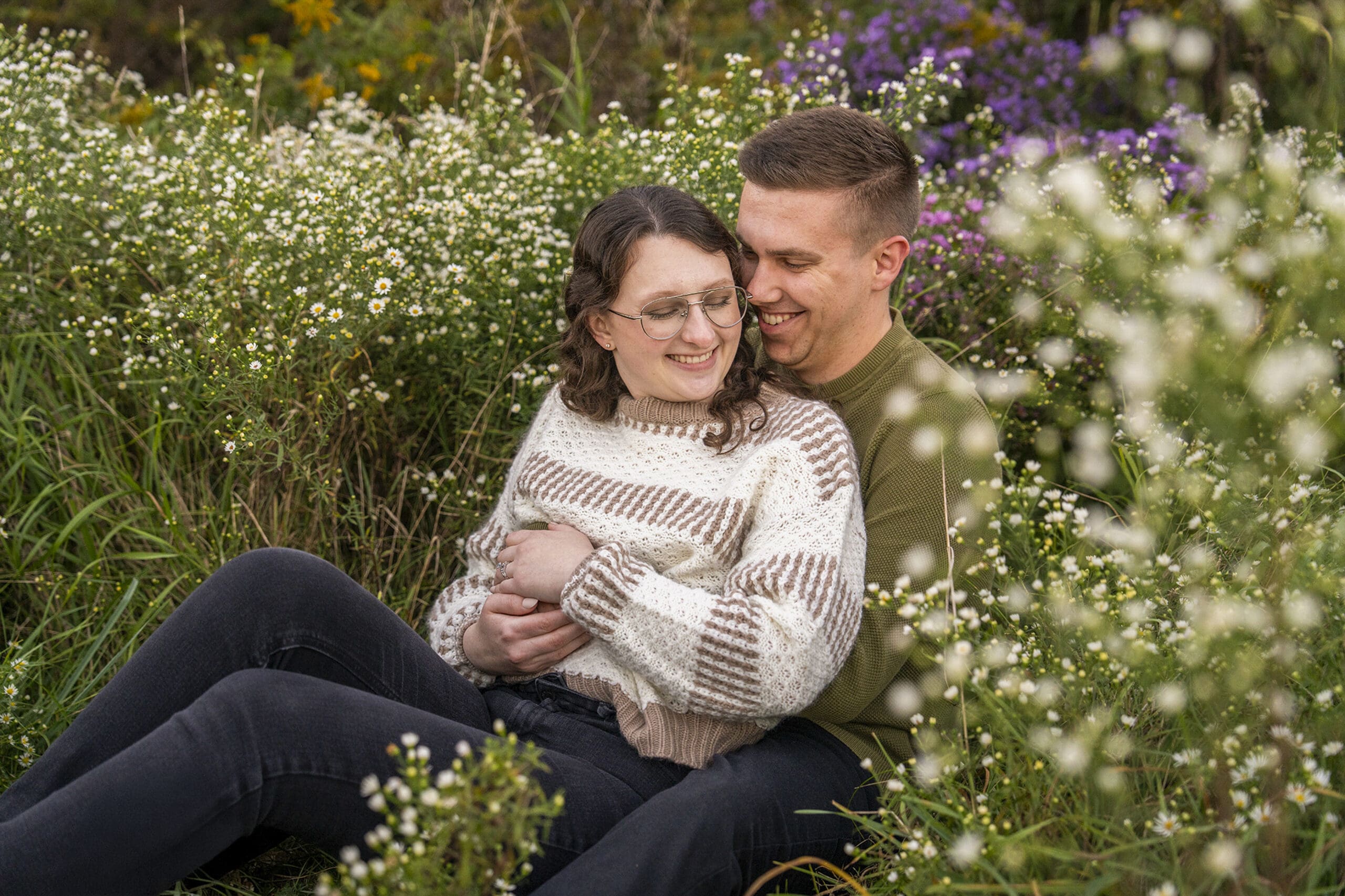 Couple sharing a quiet moment during engagement photos in Waukesha County