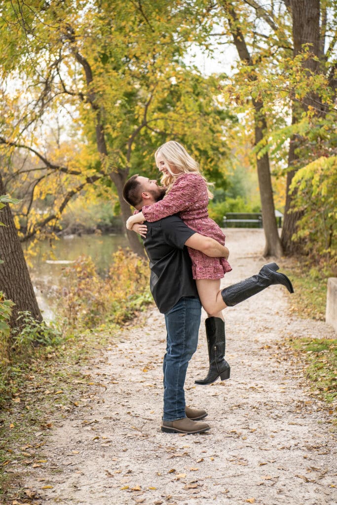 Delafield couple spinning during fall engagement 