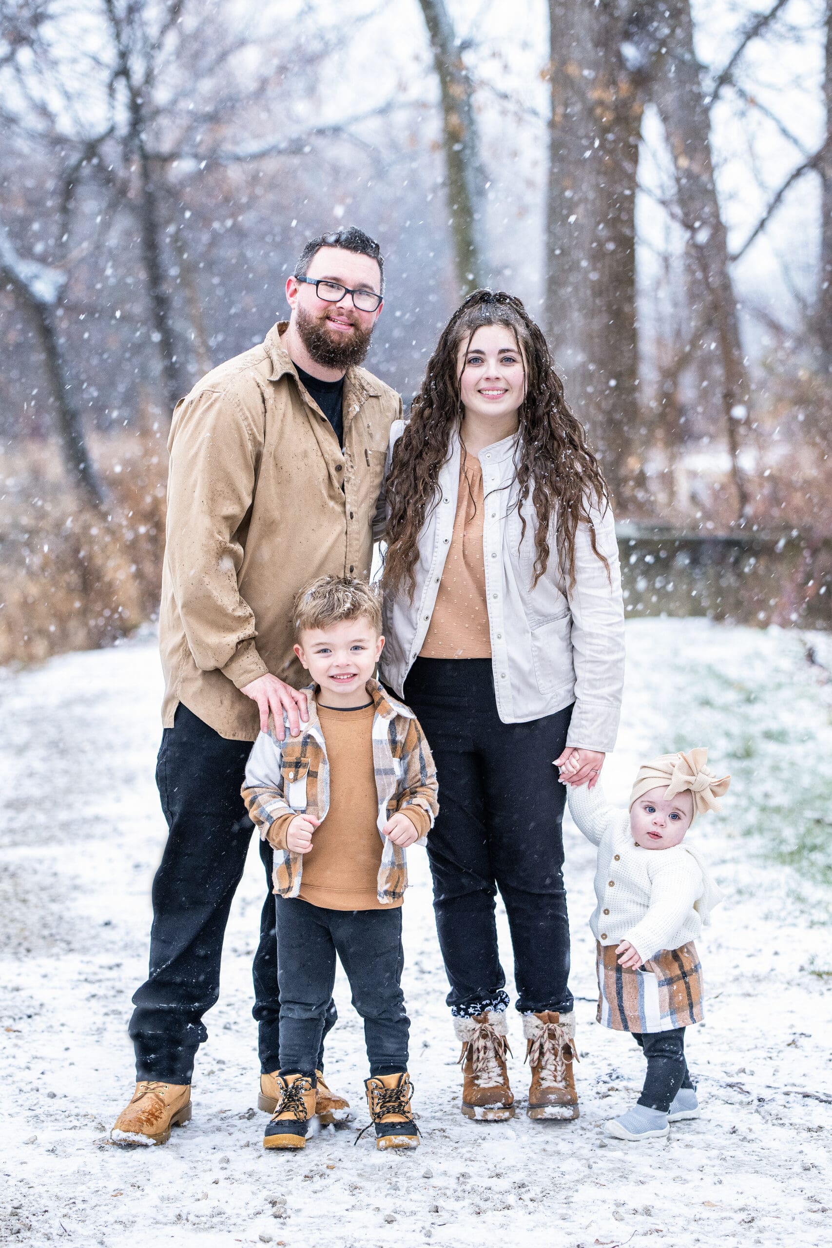Family exploring a park during a session at one of the best family photo locations in Wisconsin