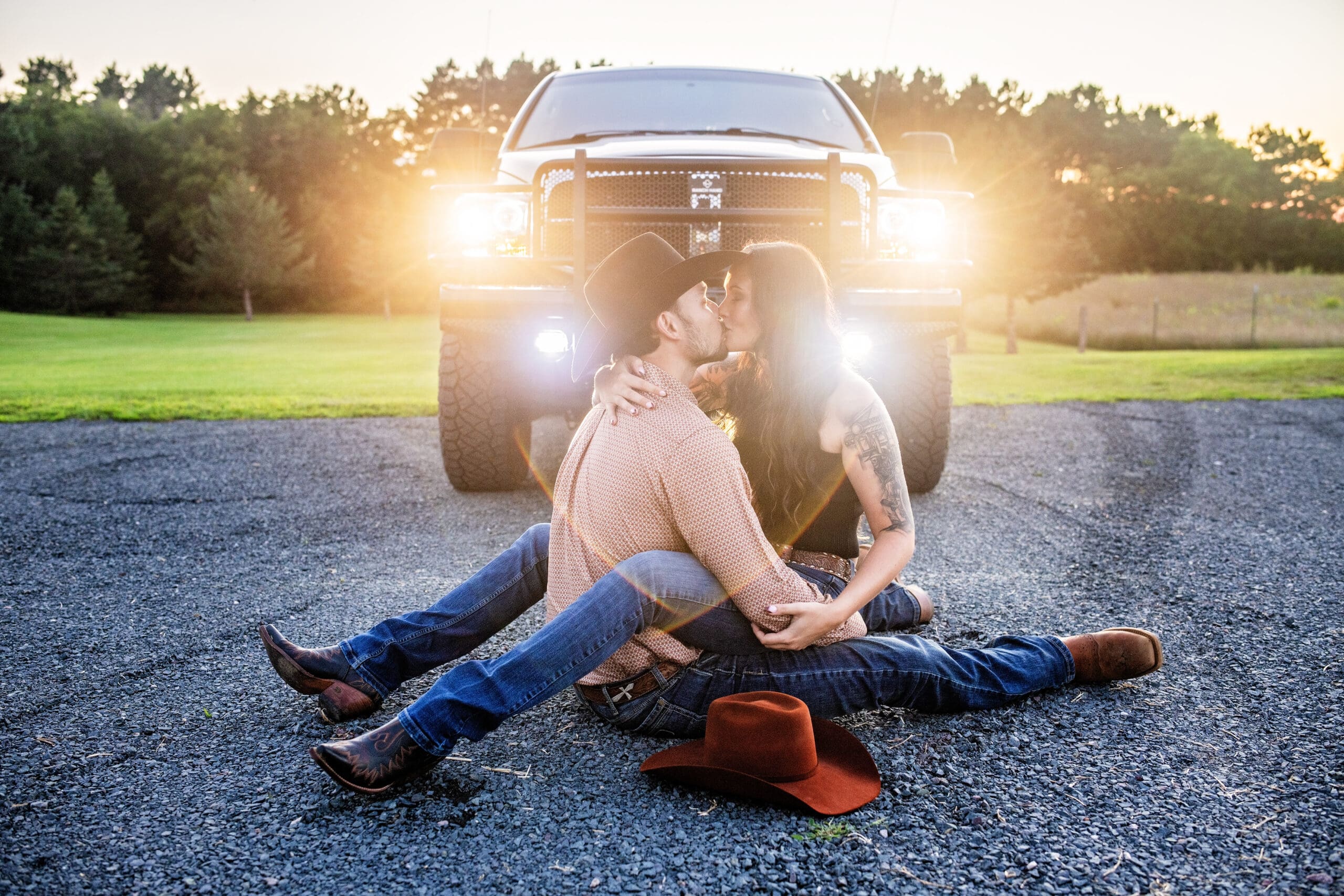 Southeast Wi couple kissing in front of truck