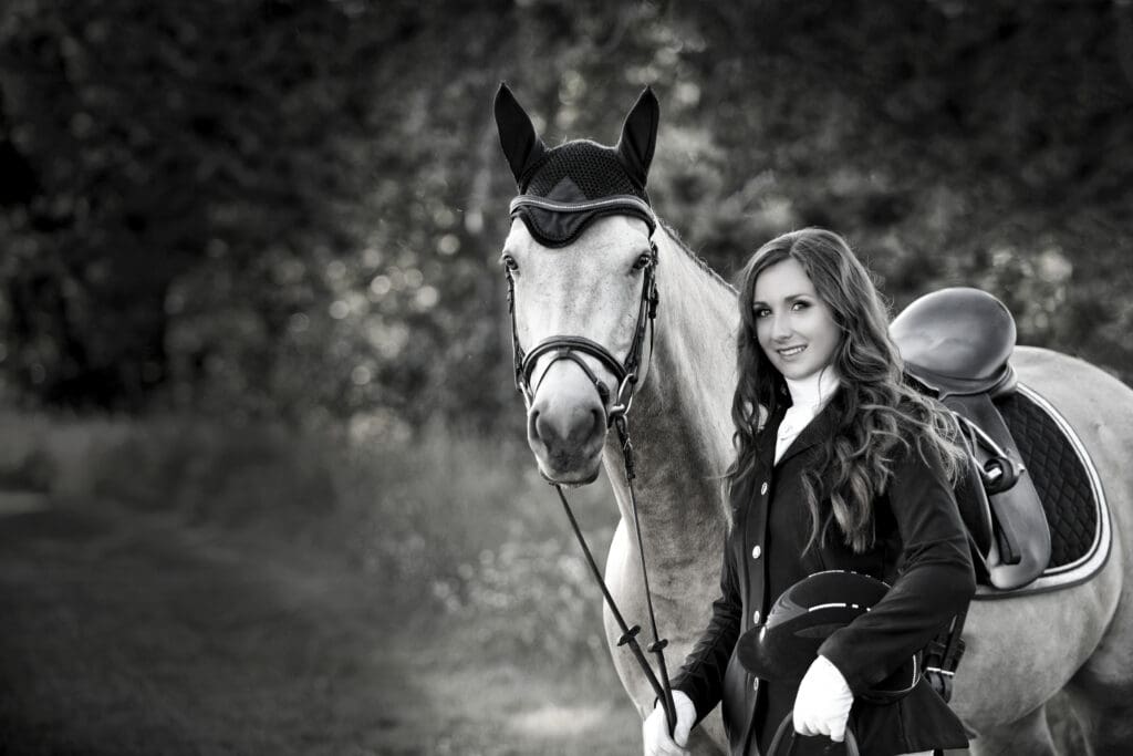 Germantown senior posing with her horse outside.
