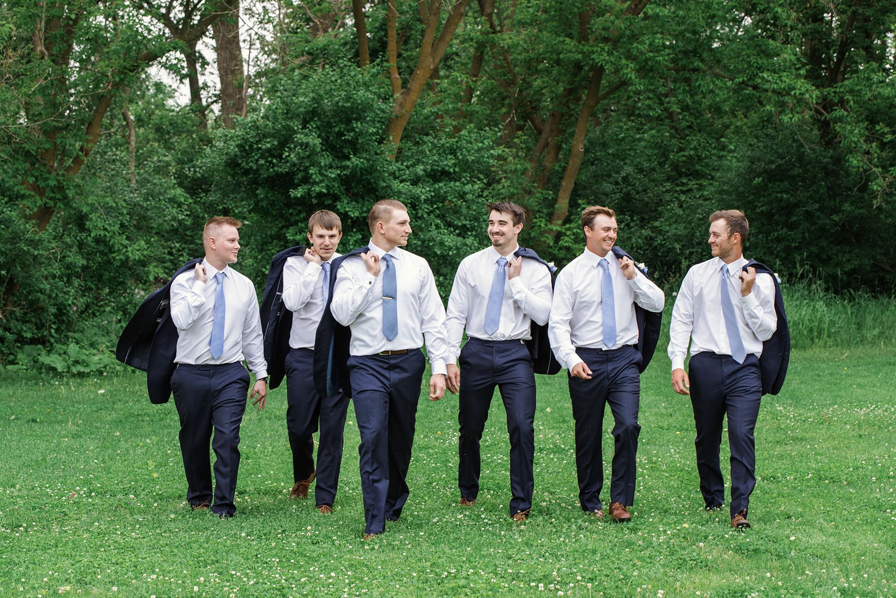 Delafield groom and groomsmen walking 