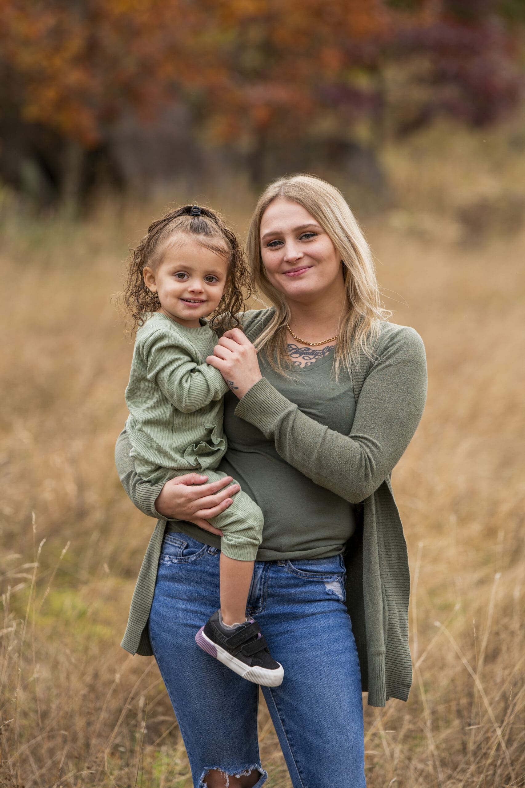 Mother holding her child during a session showing Wisconsin family photography tips