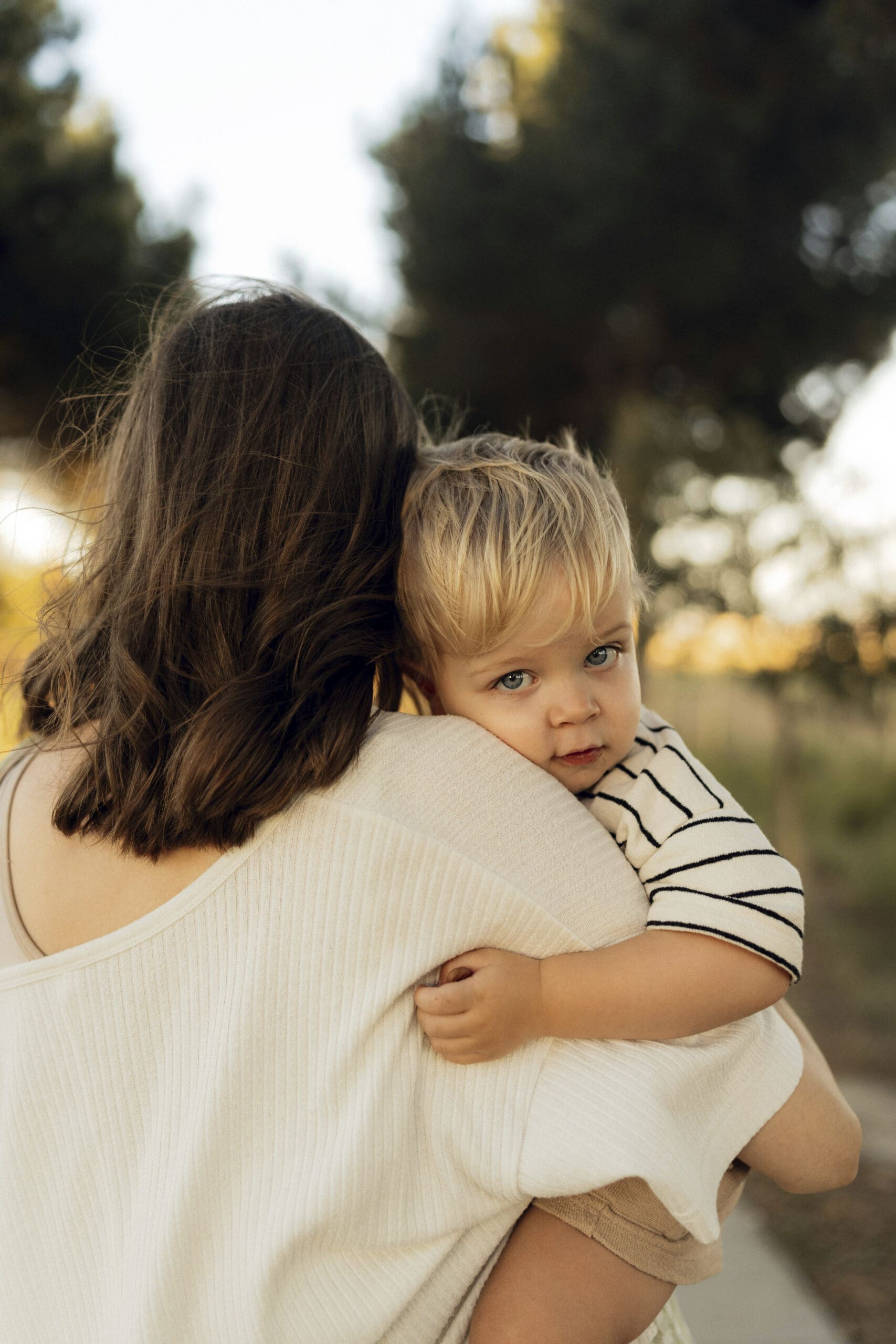 Hartland mother holding her toddler during family photos. 