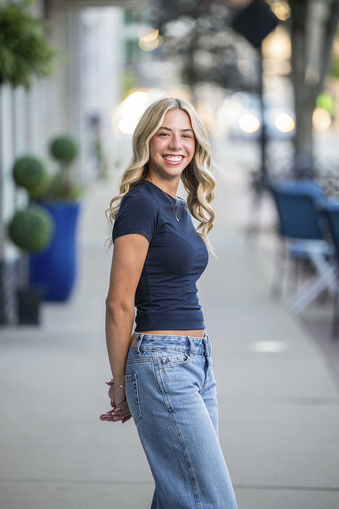 Hartland senior laughing in downtown Oconomowoc.