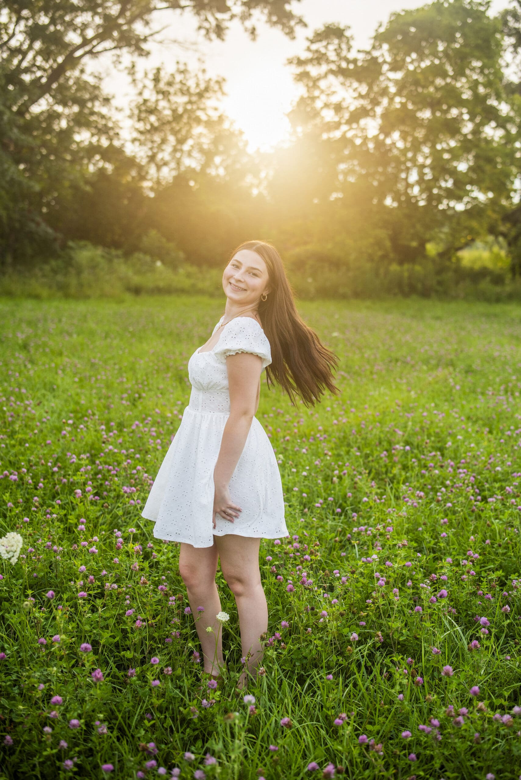 Hartland senior running through field in Retzer which is an amazing senior portrait location in wi.