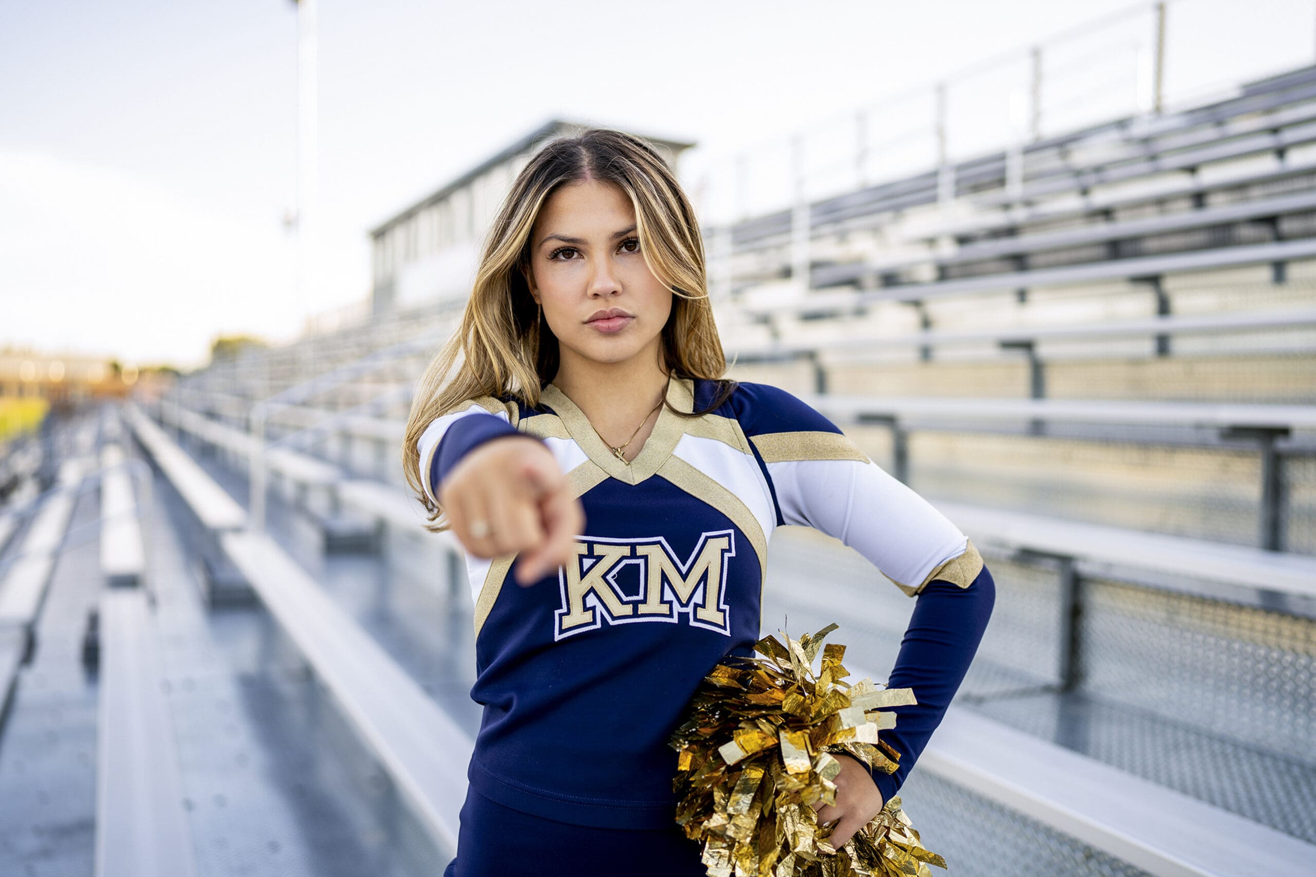 Kettle Moraine senior in her cheerleading uniform. 
