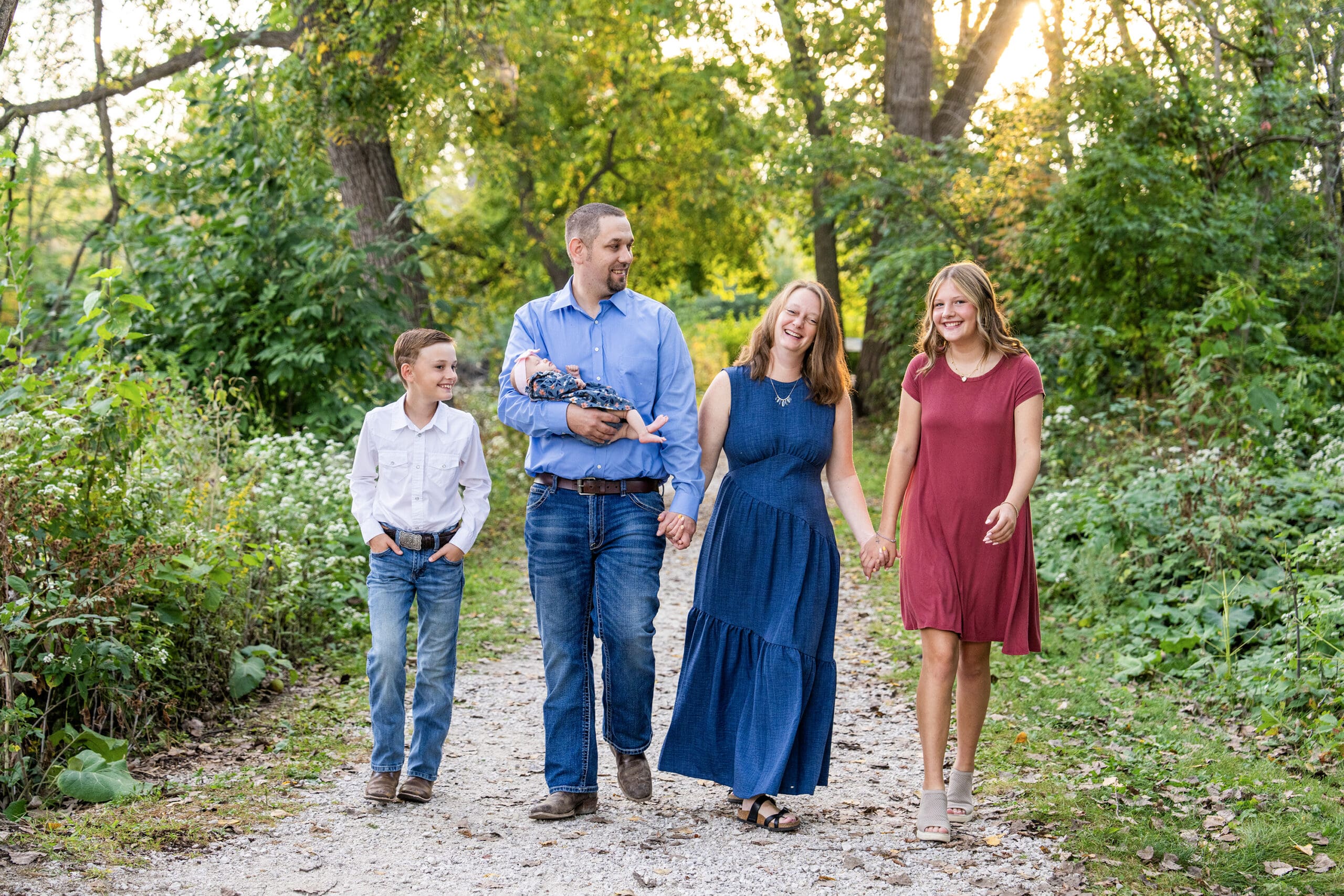 Family walking together in Delafield at one of the best family photo locations in Wisconsin