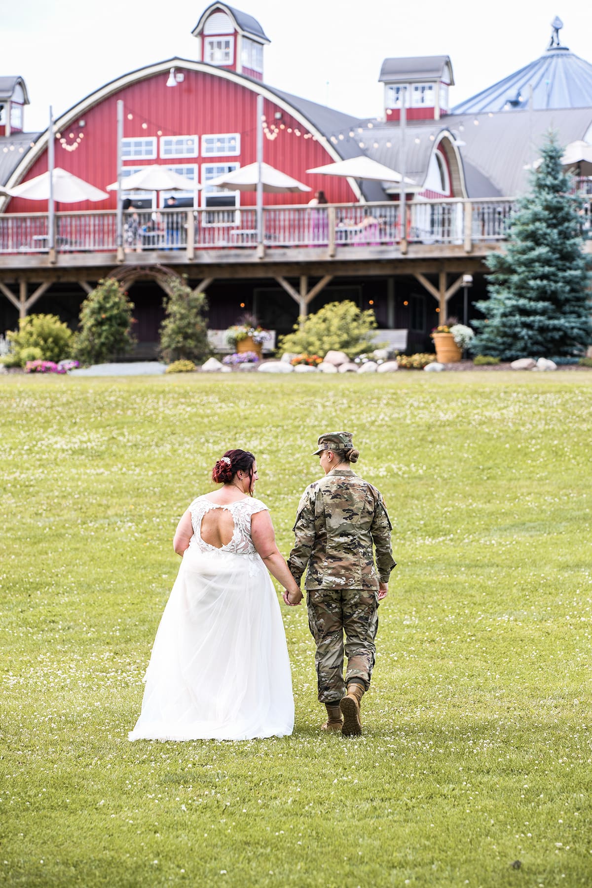 Madison bride and groom walking after sharing some time together made possible by Wisconsin wedding planning tips
