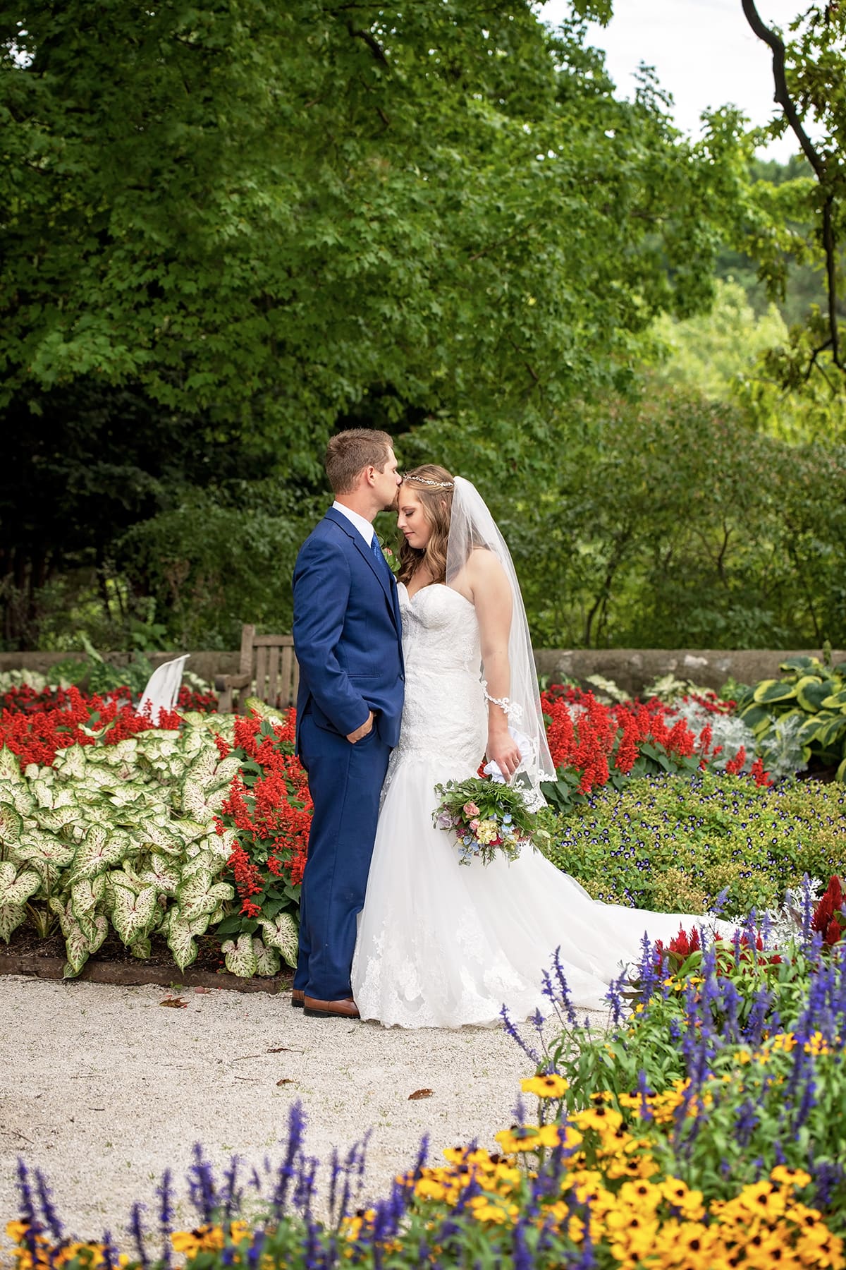 Elegant couples portraits framed by seasonal blooms at Boerner Botanical Gardens in Southeast Wisconsin