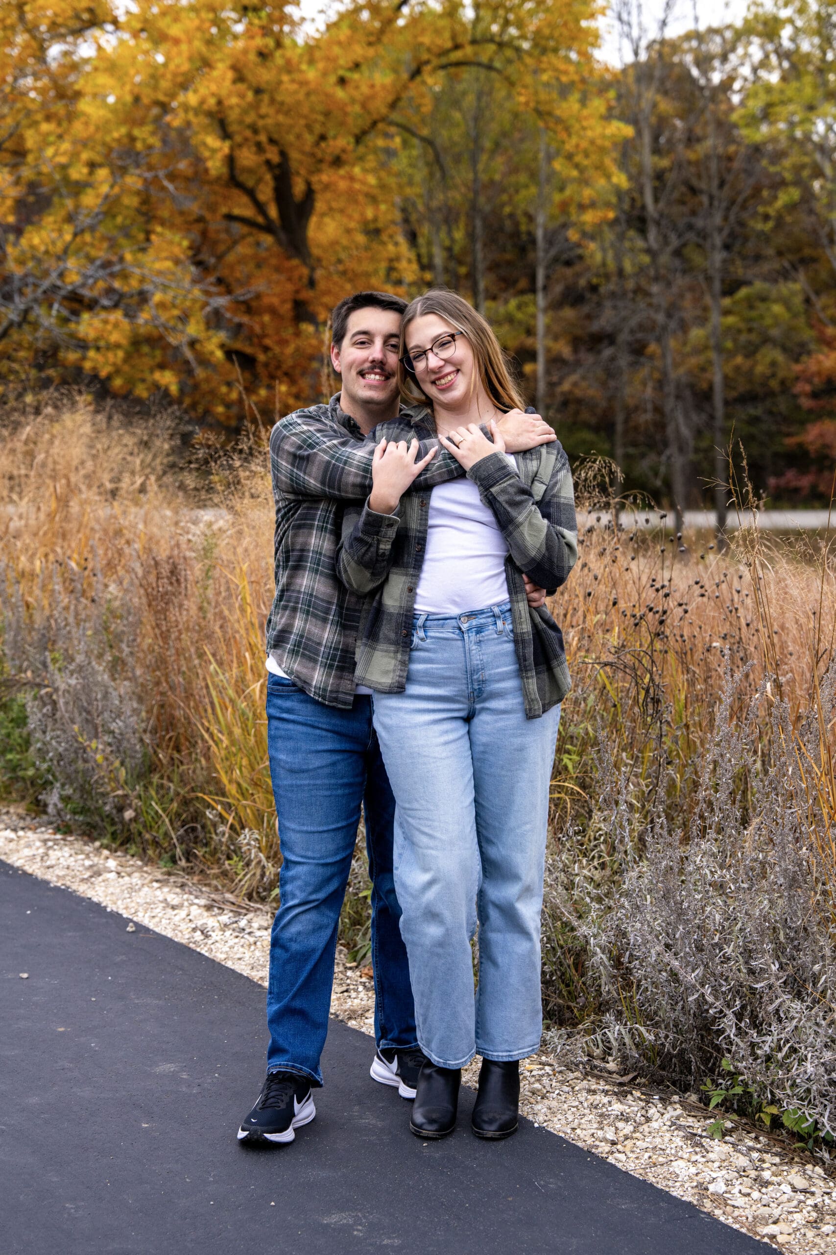 Madison couple embracing during fall engagement session