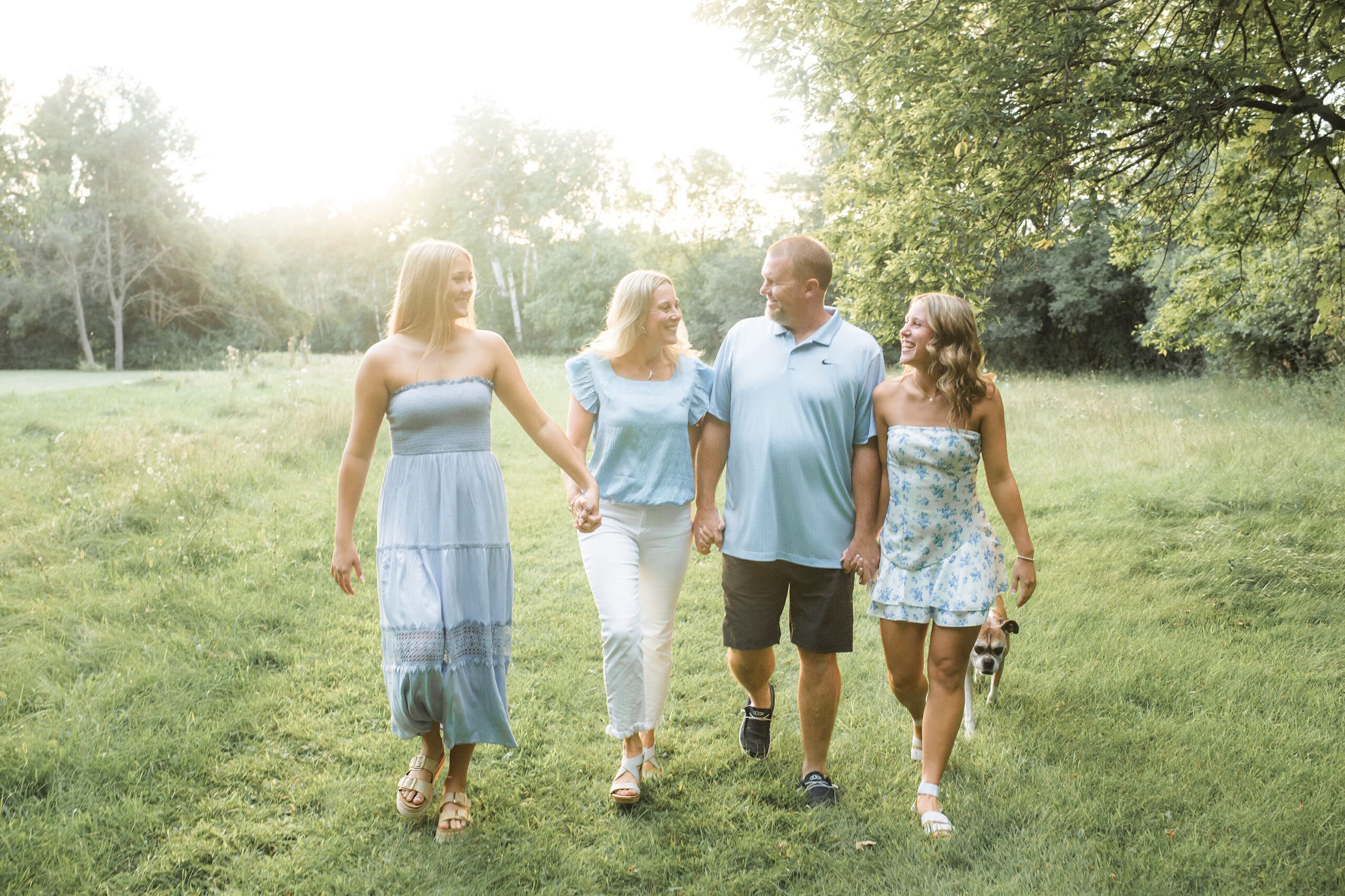 Oconomowoc family holding hands and walking in Merton