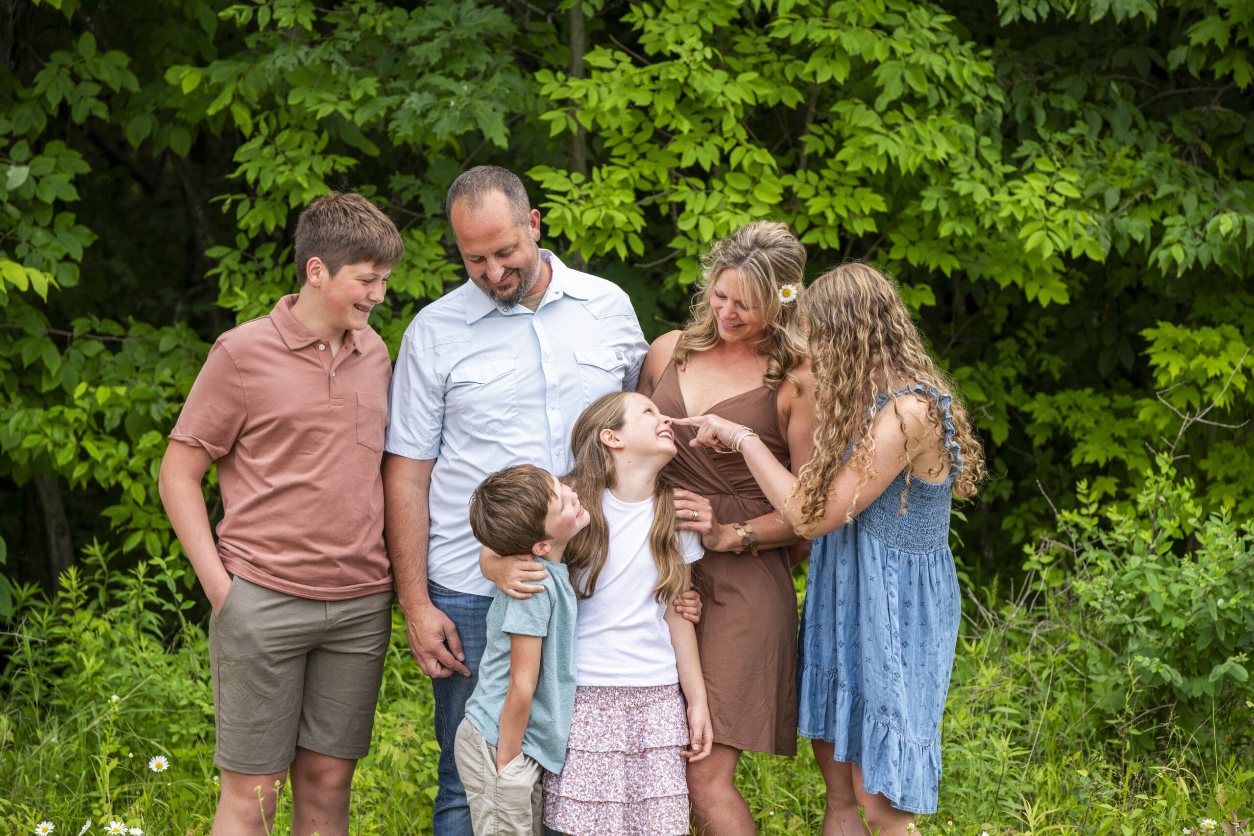 Oconomowoc family laughing during their family portrait session