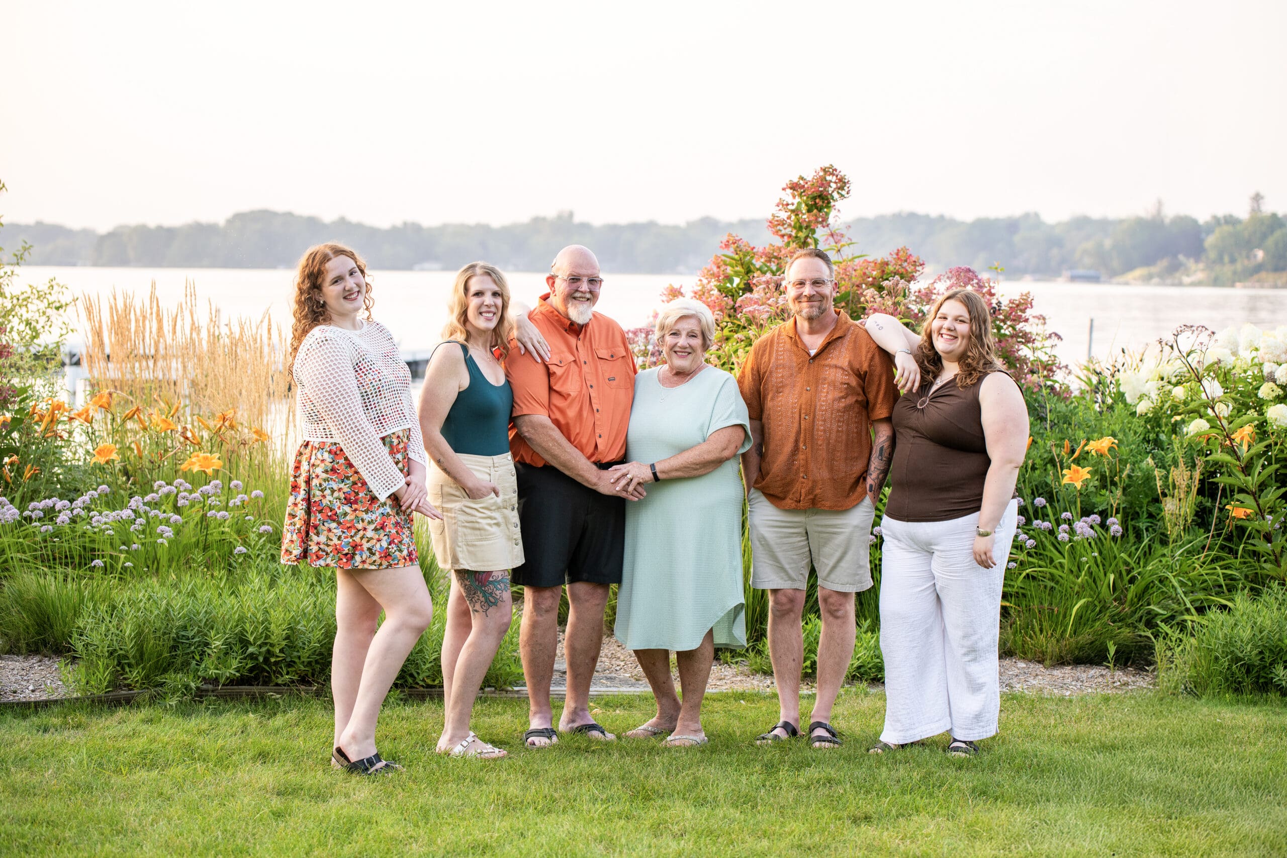 Family posing at beach in Oconomowoc
