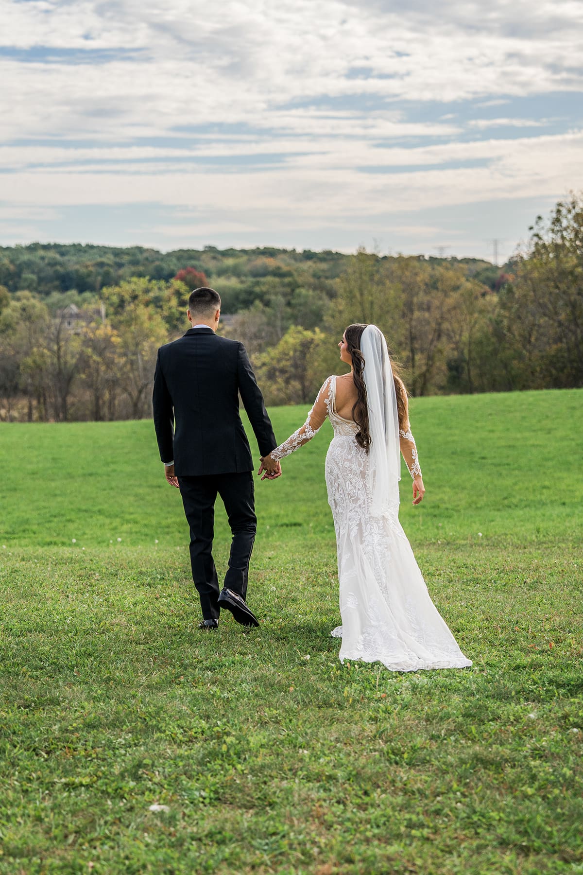 Unposed wedding photo of newlyweds at Lilac Acres wedding venue
